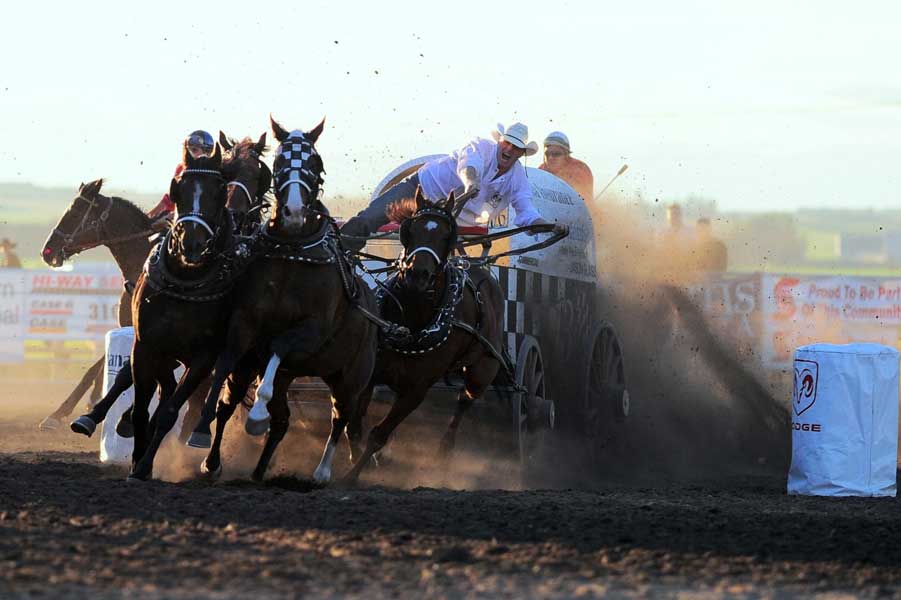 Jason Glass turning the bottom barrel, in High River, AB